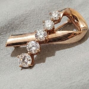 KJL rose gold tone breast cancer "pink ribbon" brooch w/ clear rhinestones